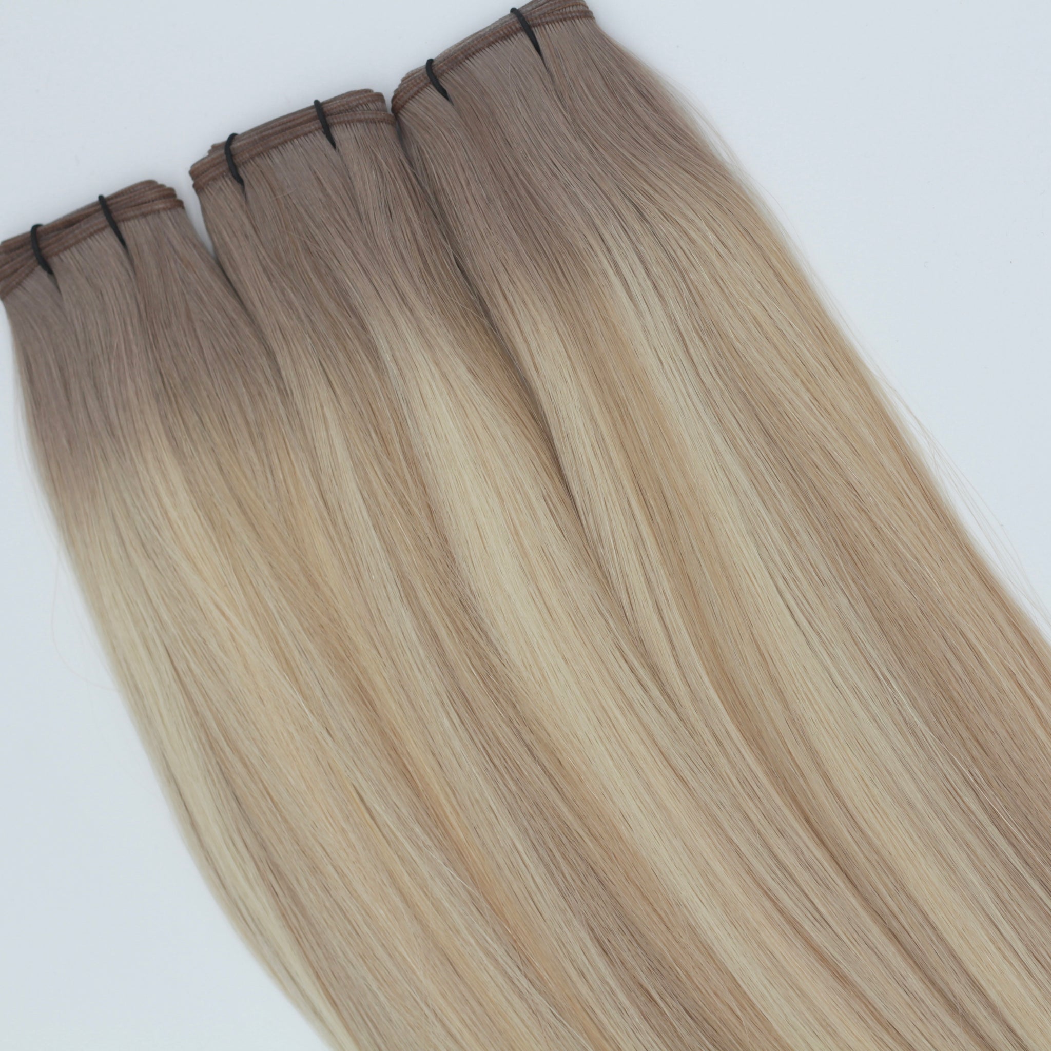 Rooted Champagne Blonde Piano - Intermix Weft